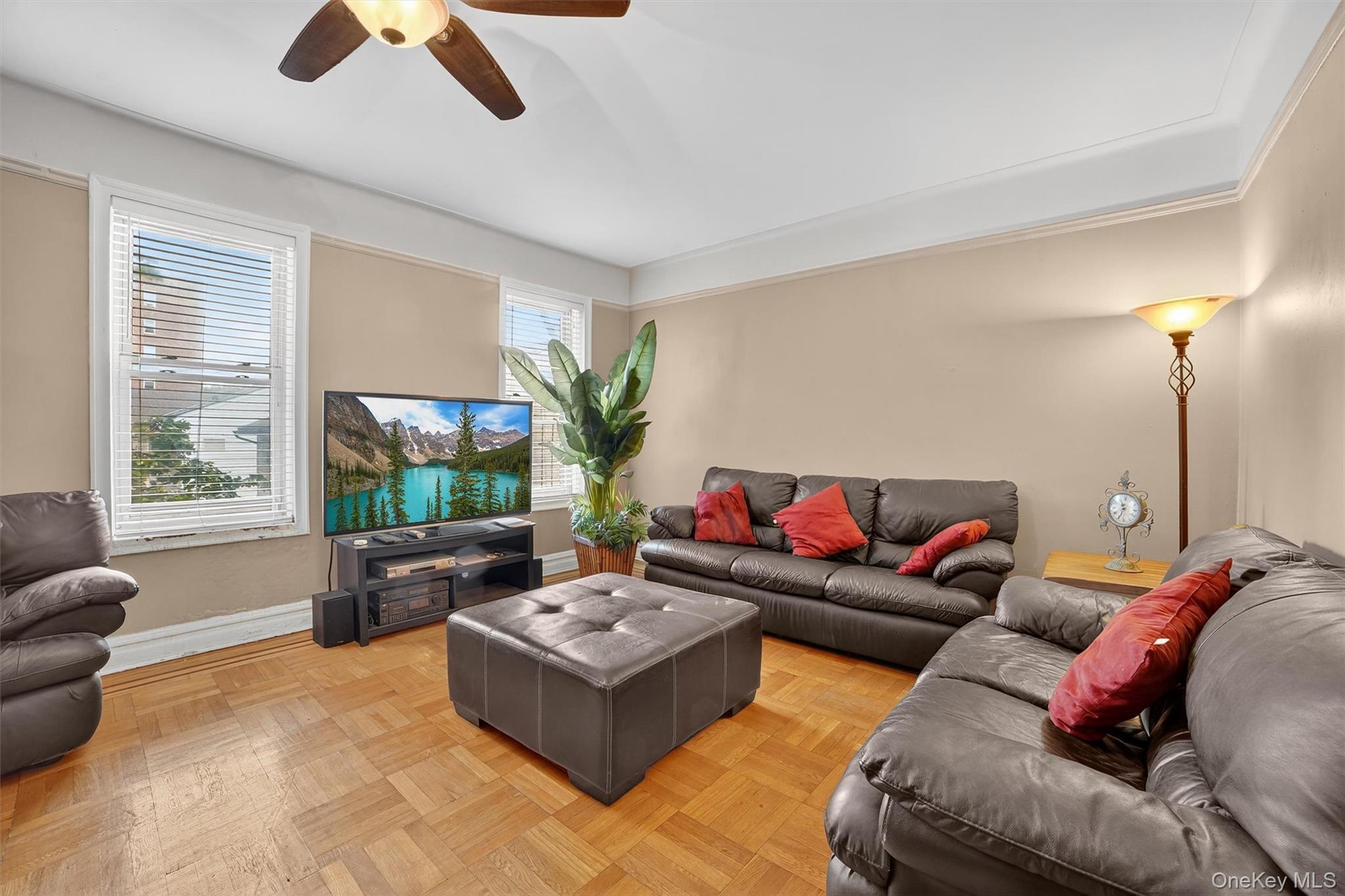 219 Bronx River Road, Unit 2L Yonkers, NY 10704 - Photo 7 of 29 a living room with furniture and a large window
