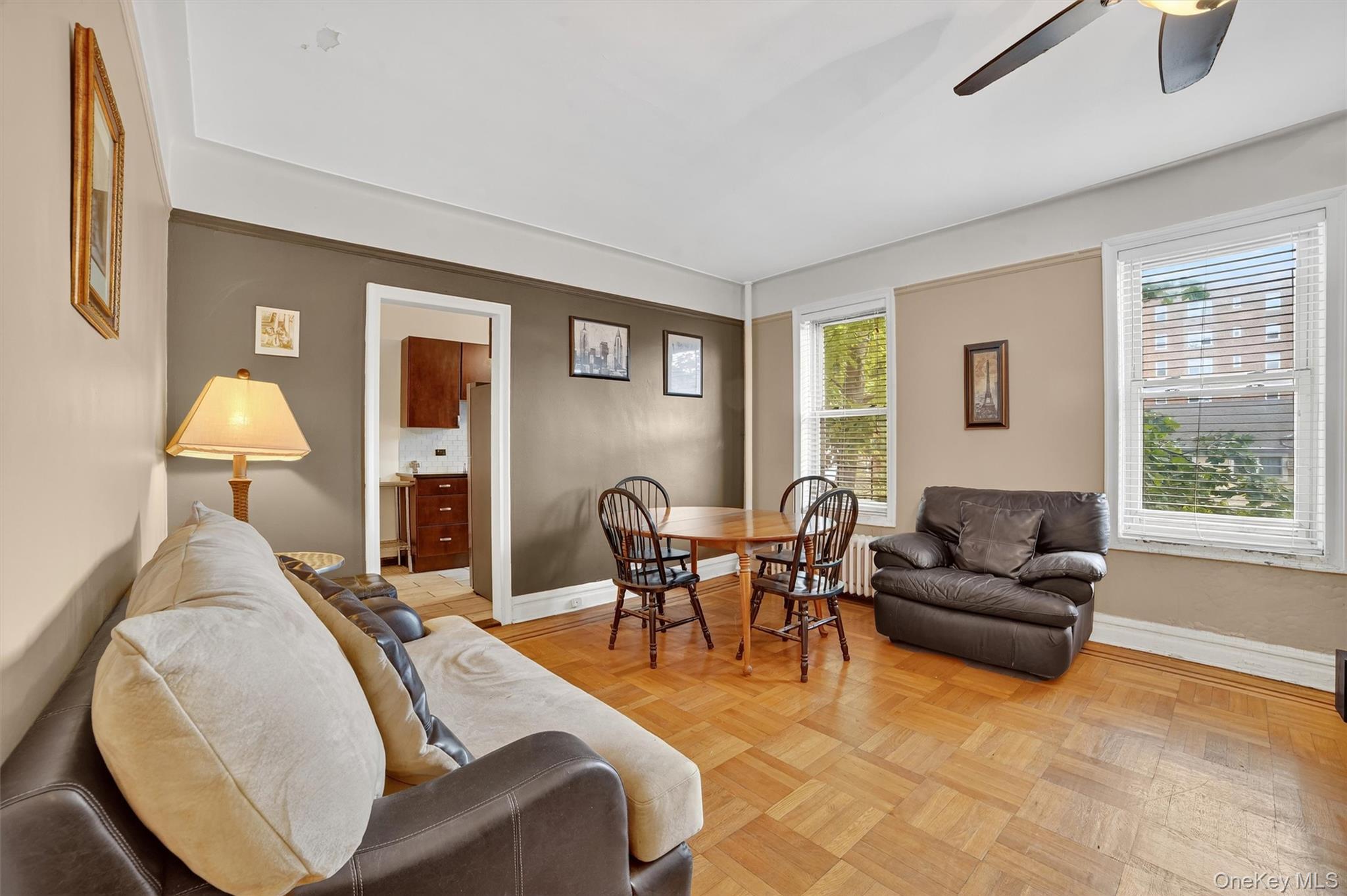 219 Bronx River Road, Unit 2L Yonkers, NY 10704 - Photo 8 of 29 a living room with furniture and a window