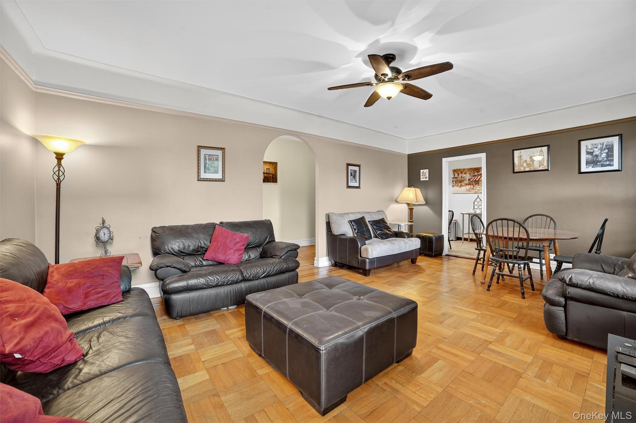 219 Bronx River Road, Unit 2L Yonkers, NY 10704 - Photo 10 of 29 a living room with furniture and wooden floor