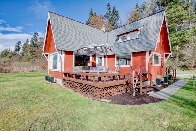 12312 Seabird Lane Bow, WA 98232 - Photo 1 of 1 a front view of a house with porch