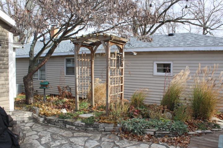 4756 East Rannells Road North Knox, IN 46534 - Photo 21 of 34 a front view of a house with garden