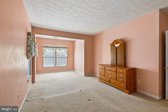 9511 Kingscroft Terrace, Unit 9511F Perry Hall, MD 21128 - Photo 30 of 38 an empty room with windows