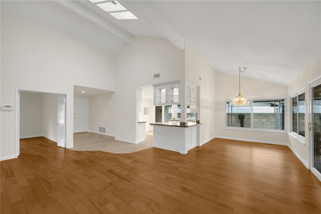 485 Castlegate Lane Brea, CA 92821 - Photo 15 of 41 a view of kitchen and hall with wooden floor