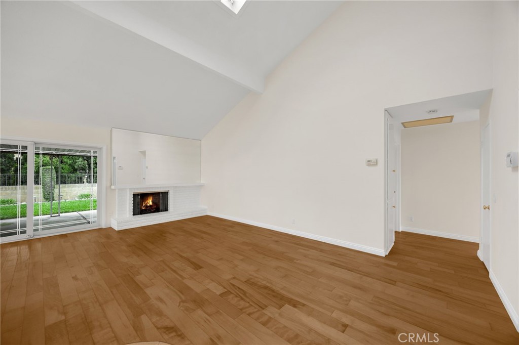 485 Castlegate Lane Brea, CA 92821 - Photo 16 of 41 a view of empty room with floor to ceiling window