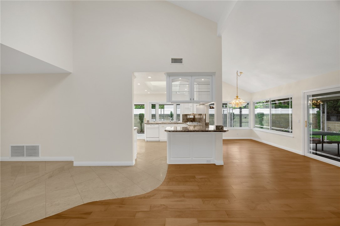 485 Castlegate Lane Brea, CA 92821 - Photo 17 of 41 a large white kitchen with a large window