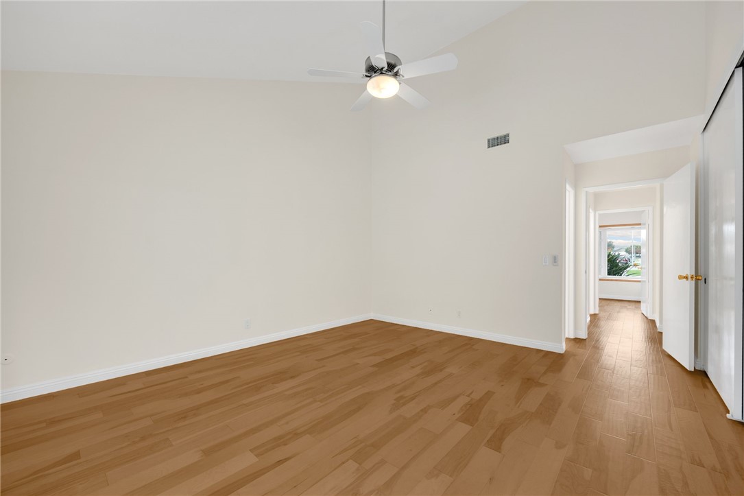 485 Castlegate Lane Brea, CA 92821 - Photo 21 of 41 a view of an empty room with wooden floor