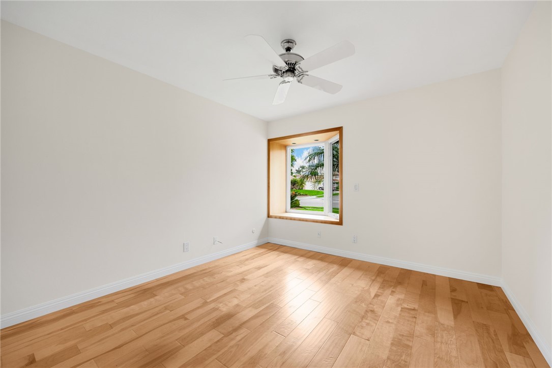485 Castlegate Lane Brea, CA 92821 - Photo 25 of 41 an empty room with a window and a fan