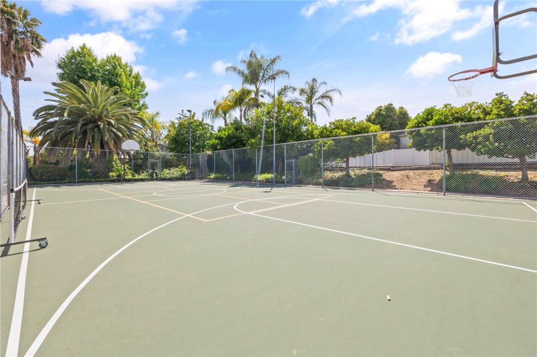 485 Castlegate Lane Brea, CA 92821 - Photo 40 of 41 a view of a tennis court with palm trees