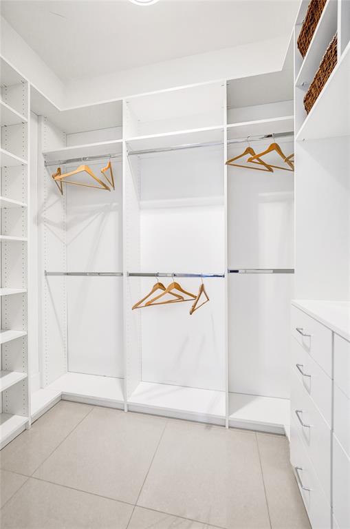 2617 Northeast 14th Avenue, Unit 507 Wilton Manors, FL 33334 - Photo 19 of 65 a view of a bathroom with a tub and a shower