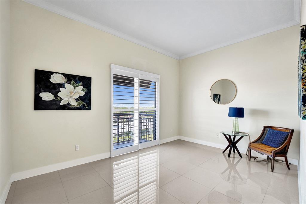 2617 Northeast 14th Avenue, Unit 507 Wilton Manors, FL 33334 - Photo 25 of 65 a view of a livingroom with furniture and a window