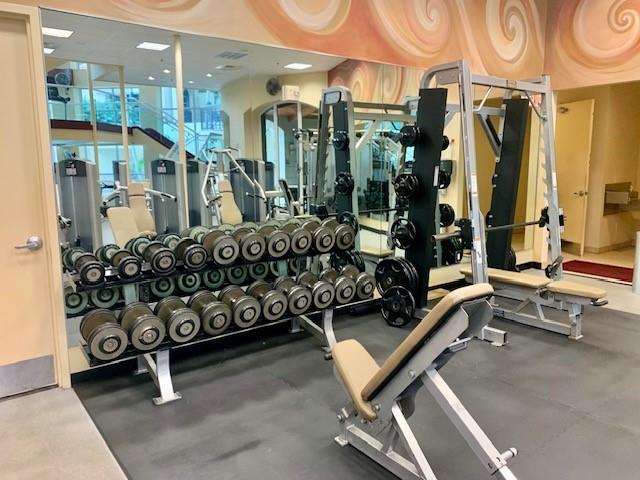 2617 Northeast 14th Avenue, Unit 507 Wilton Manors, FL 33334 - Photo 45 of 65 a view of a room with gym equipment