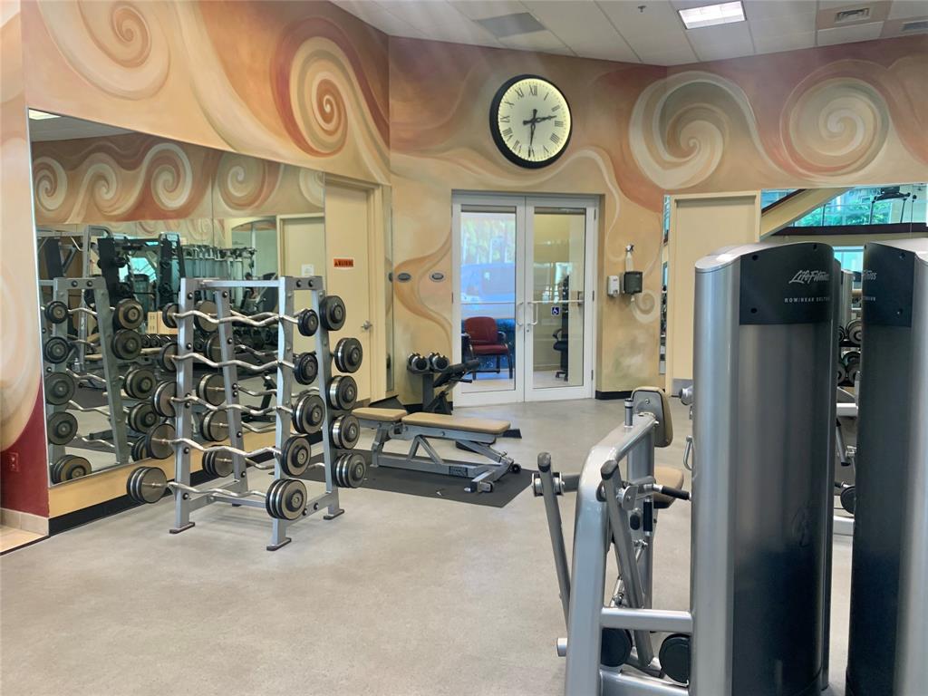 2617 Northeast 14th Avenue, Unit 507 Wilton Manors, FL 33334 - Photo 47 of 65 a view of a room with gym equipment