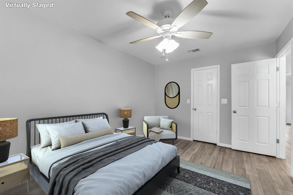 7 Market Loop Morgan's Point Resort, TX 76513 - Photo 22 of 31 Spacious bedroom featuring wood-finish flooring and a ceiling fan. Virtually staged