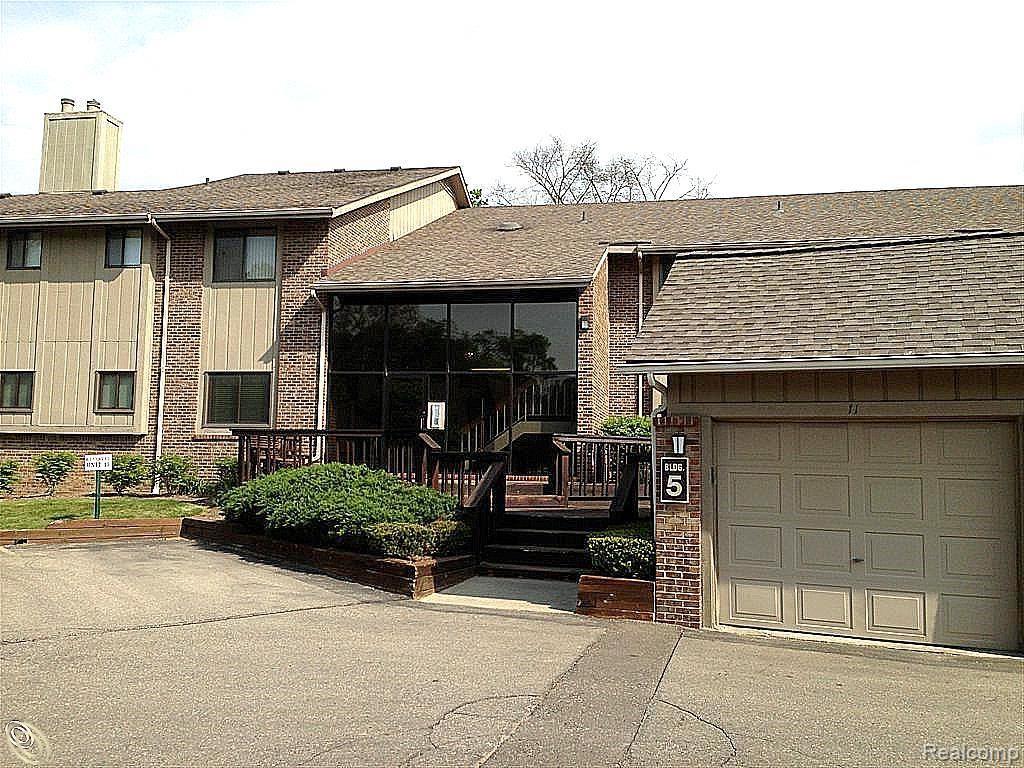 11747 Sycamore Road, Unit 12 Plymouth, MI 48170 - Photo 1 of 14 SYCAMORE FRONT 1.jpg
