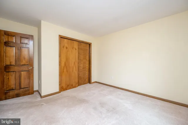 a room with furniture and a window