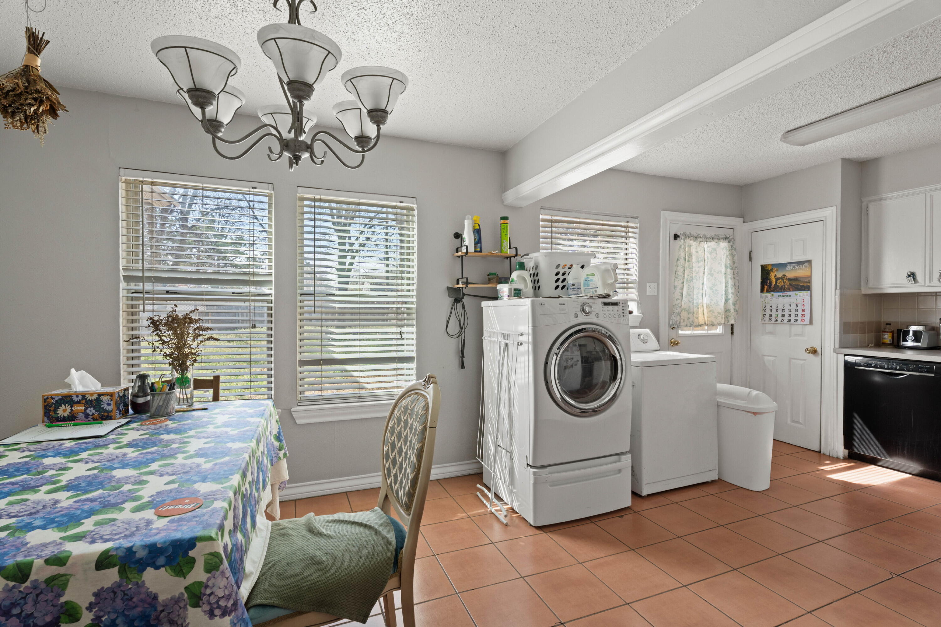 2703 23rd Street Lubbock, TX 79410 - Photo 5 of 11 a view of a livingroom with furniture washer and dryer