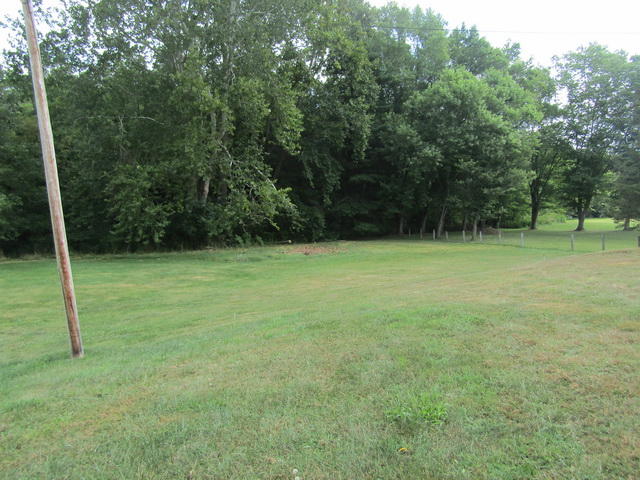 3633 Childress Road Christiansburg, VA 24073 - Photo 13 of 17 a view of a field with a tree