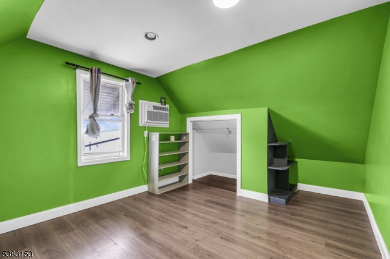 433 3rd Avenue Elizabeth Port, NJ 07206 - Photo 25 of 36 a view of an empty room with kitchen and a window