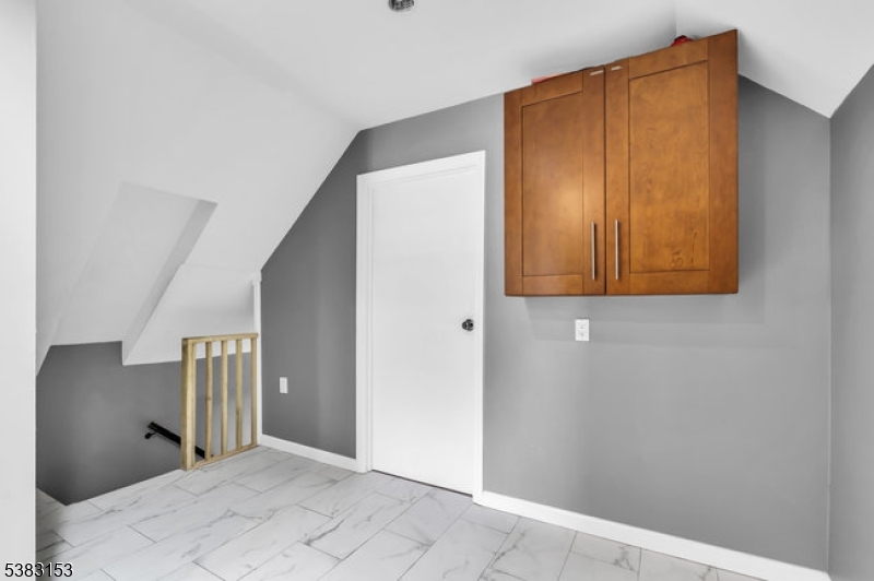 433 3rd Avenue Elizabeth Port, NJ 07206 - Photo 27 of 36 a view of a hallway with entryway door