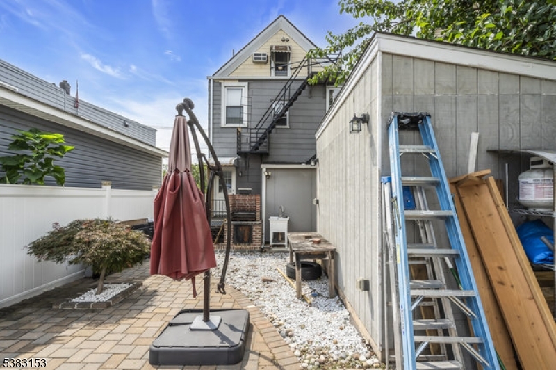 433 3rd Avenue Elizabeth Port, NJ 07206 - Photo 36 of 36 a front view of a house with a yard