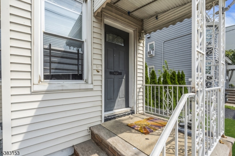 433 3rd Avenue Elizabeth Port, NJ 07206 - Photo 4 of 36 a view of a balcony with floor to ceiling windows