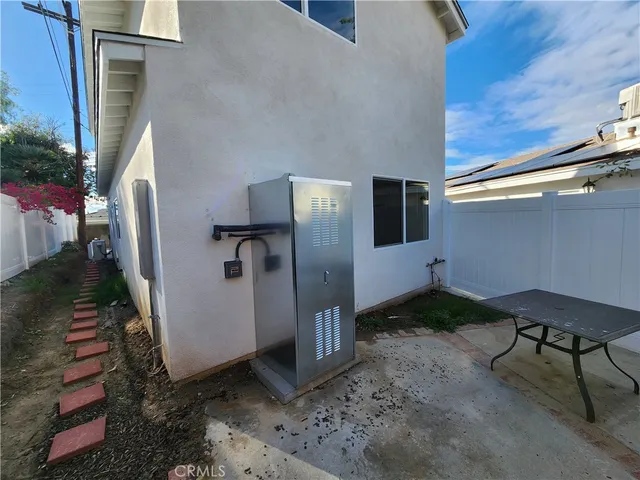 a backyard of a house with seating space