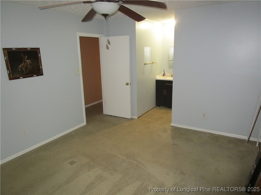 821 Rock Spring Road Fayetteville, NC 28314 - Photo 15 of 23 an empty room with windows