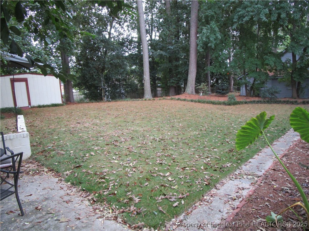 821 Rock Spring Road Fayetteville, NC 28314 - Photo 20 of 23 a view of outdoor space with trees