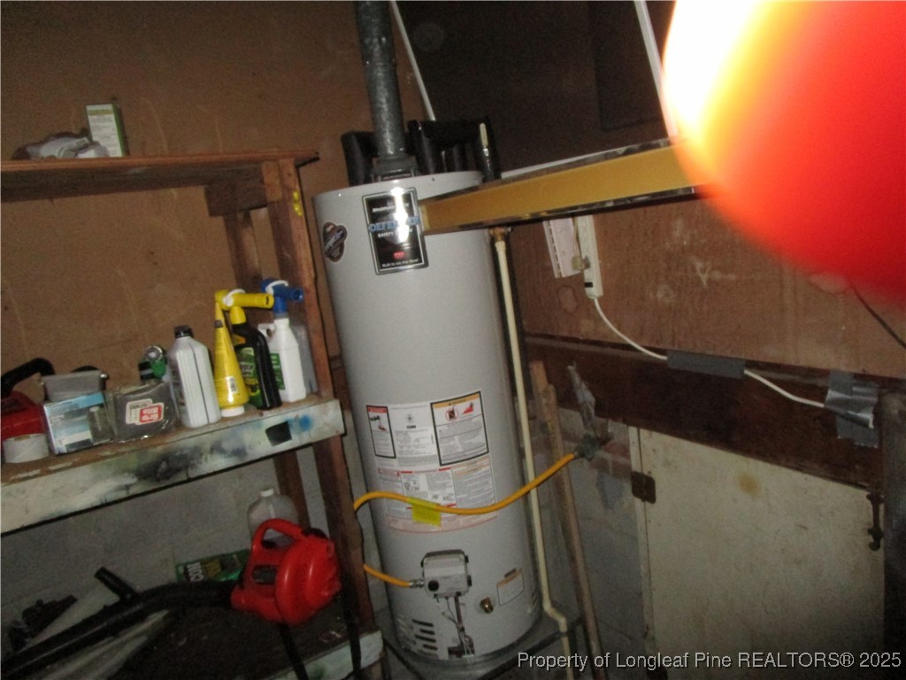 821 Rock Spring Road Fayetteville, NC 28314 - Photo 21 of 23 a view of storage and utility room