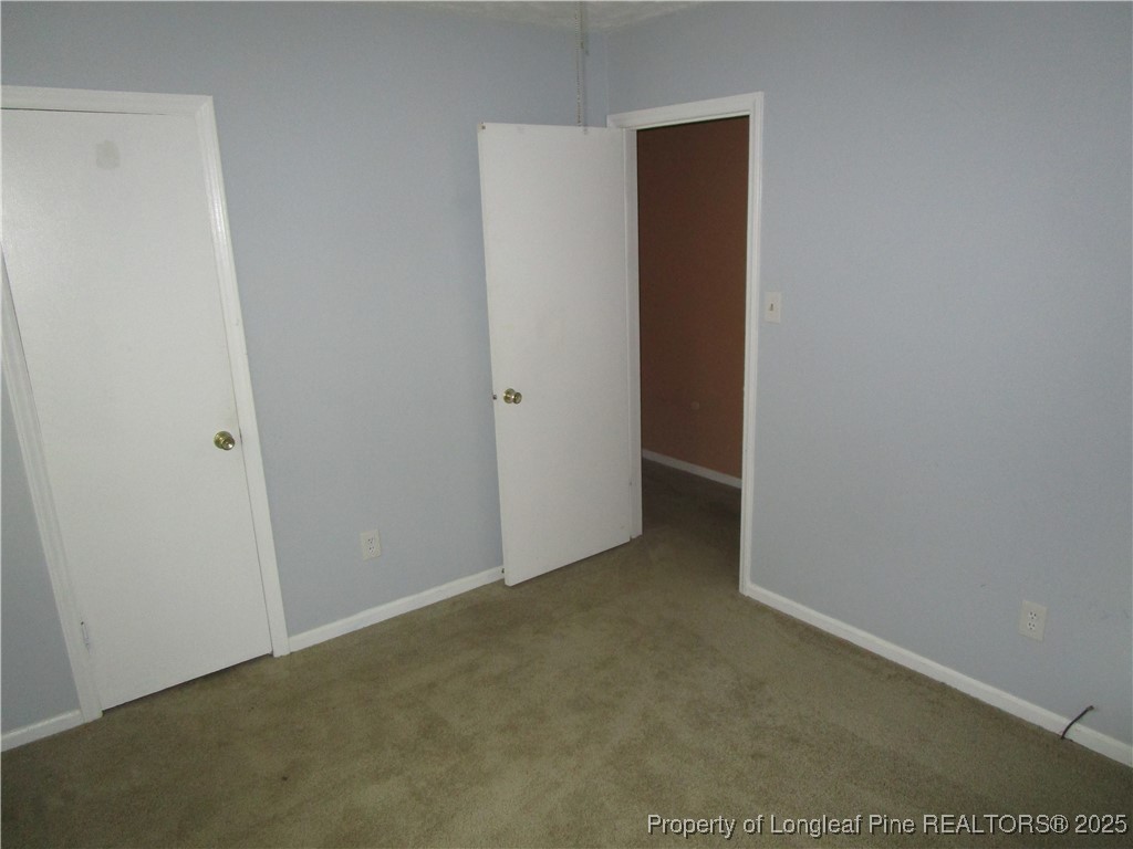 821 Rock Spring Road Fayetteville, NC 28314 - Photo 7 of 23 a view of an empty room