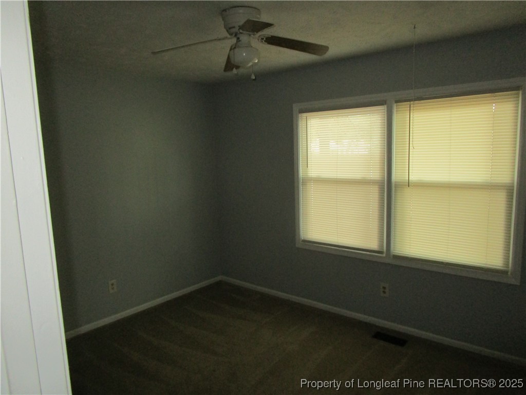 821 Rock Spring Road Fayetteville, NC 28314 - Photo 10 of 23 an empty room with a window