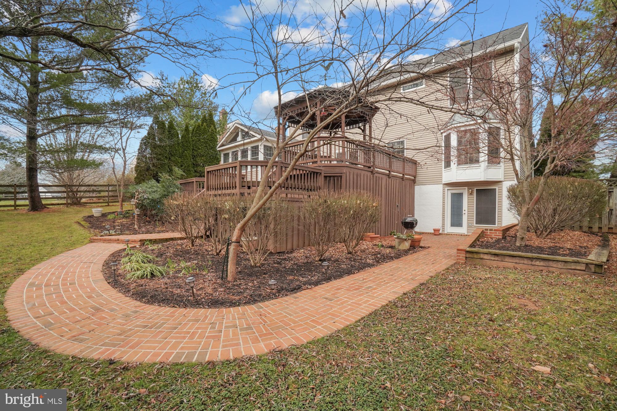 16908 Hoskinson Road Poolesville, MD 20837 - Photo 13 of 72 Quality hardscape leading to basement walk-out!