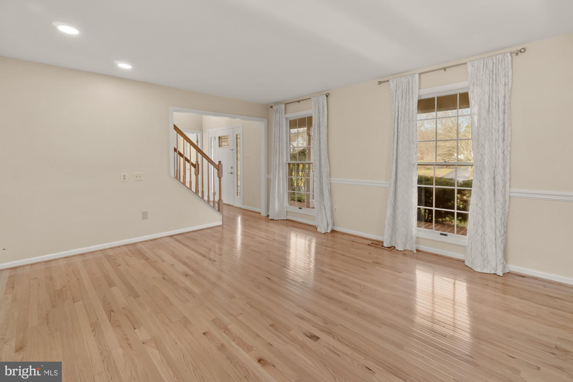 16908 Hoskinson Road Poolesville, MD 20837 - Photo 24 of 72 wooden floor in an empty room with a window