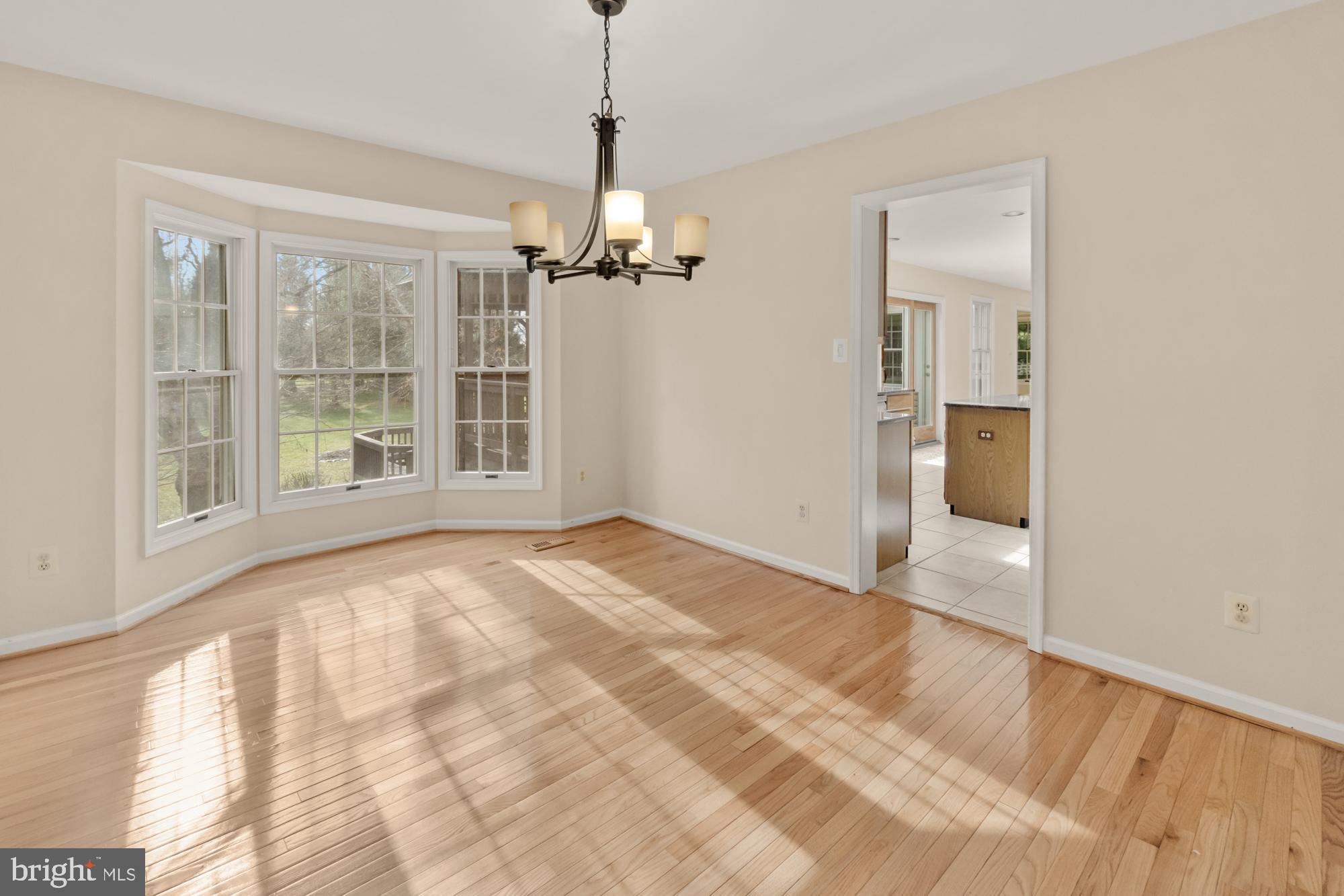 16908 Hoskinson Road Poolesville, MD 20837 - Photo 32 of 72 a view of an empty room with a window