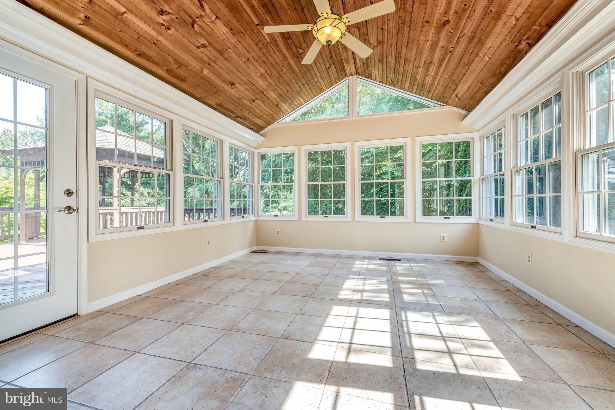 16908 Hoskinson Road Poolesville, MD 20837 - Photo 34 of 72 a view of an empty room with a window