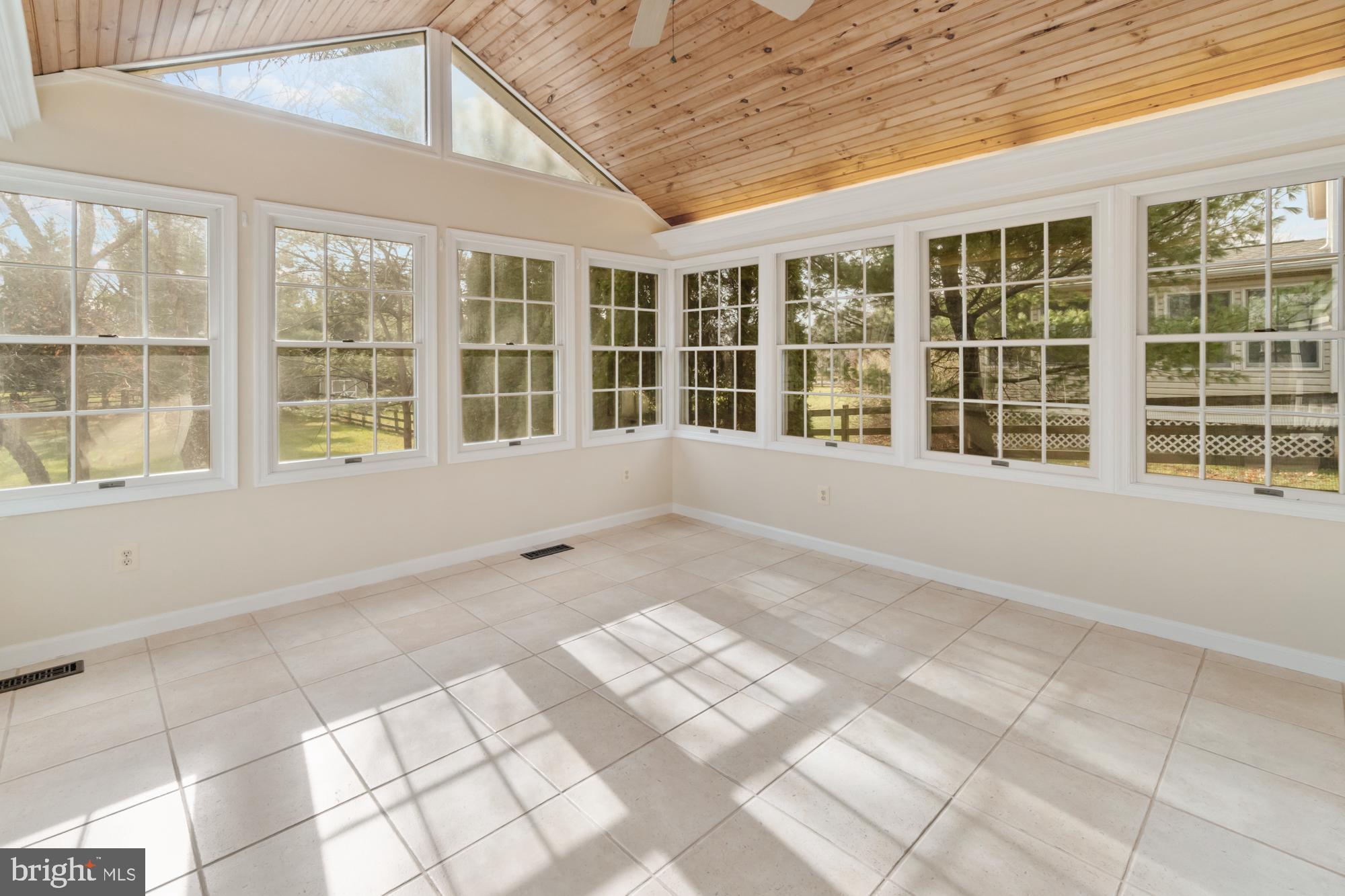 16908 Hoskinson Road Poolesville, MD 20837 - Photo 35 of 72 a view of an empty room with a window