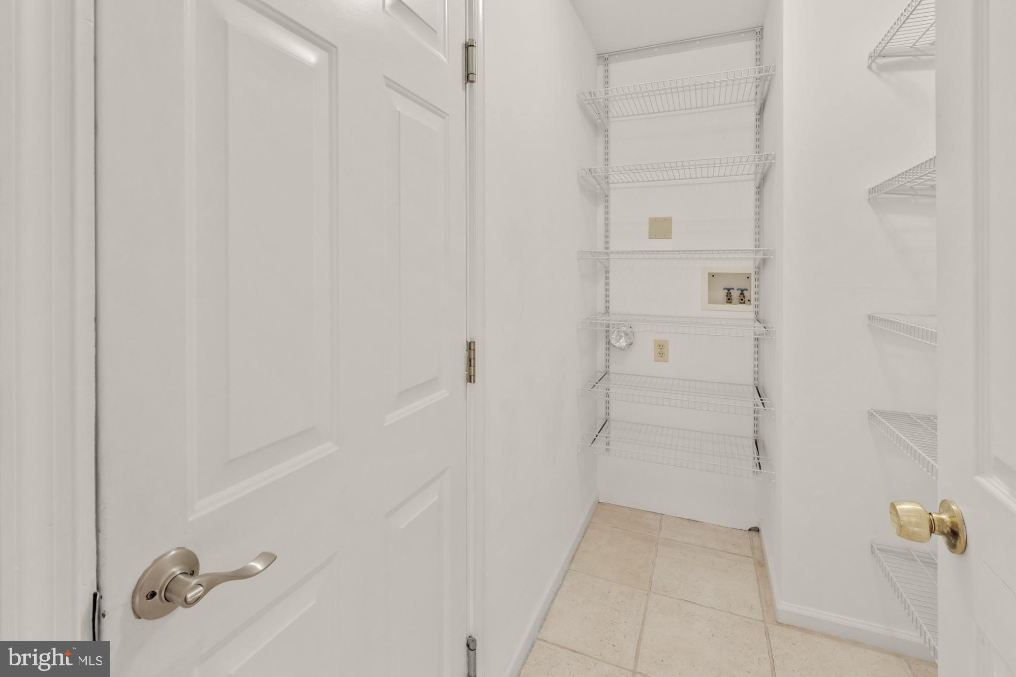 16908 Hoskinson Road Poolesville, MD 20837 - Photo 37 of 72 Mudroom is also set up for main floor laundry