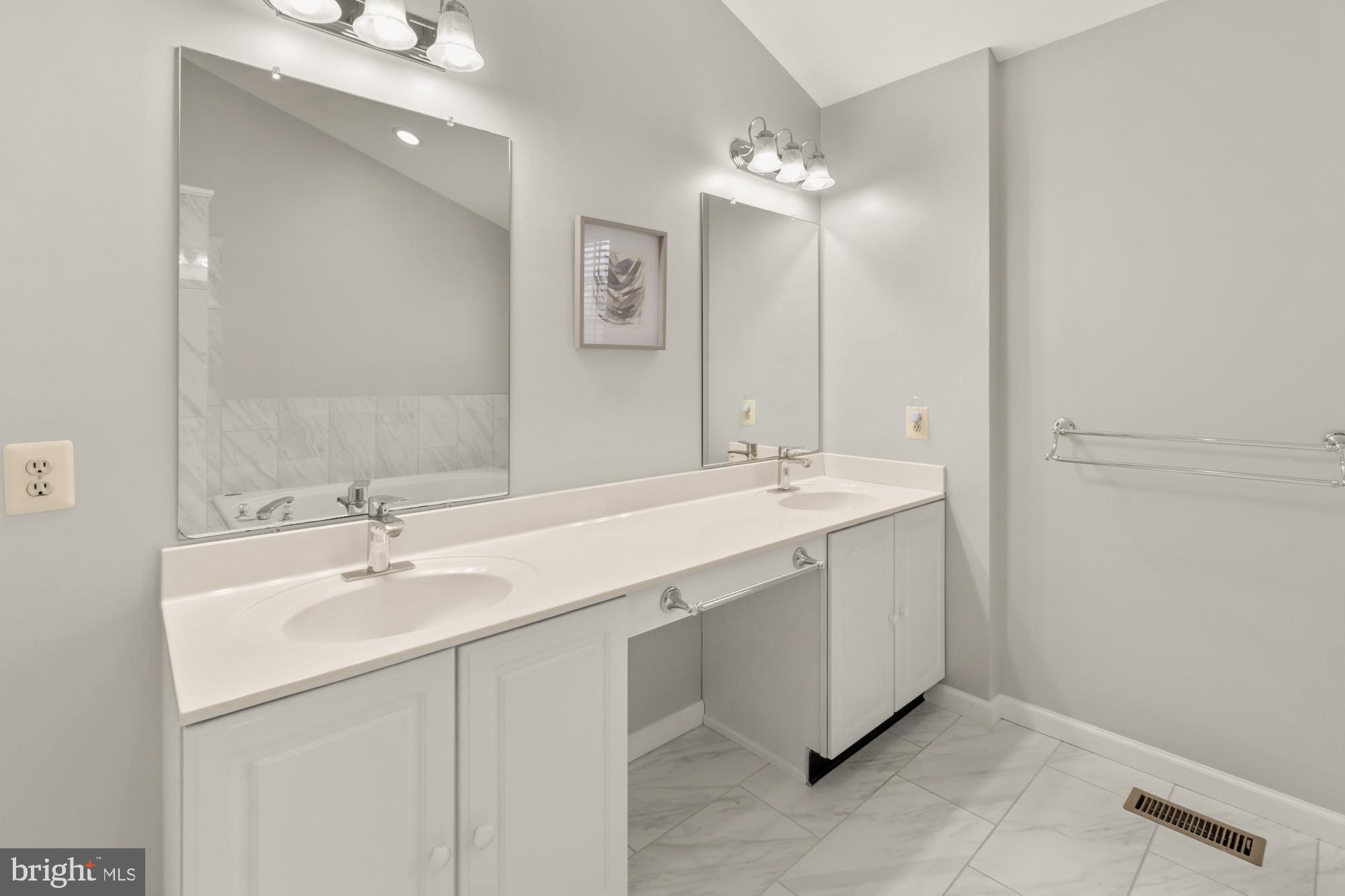 16908 Hoskinson Road Poolesville, MD 20837 - Photo 43 of 72 a bathroom with a double vanity sink mirror and