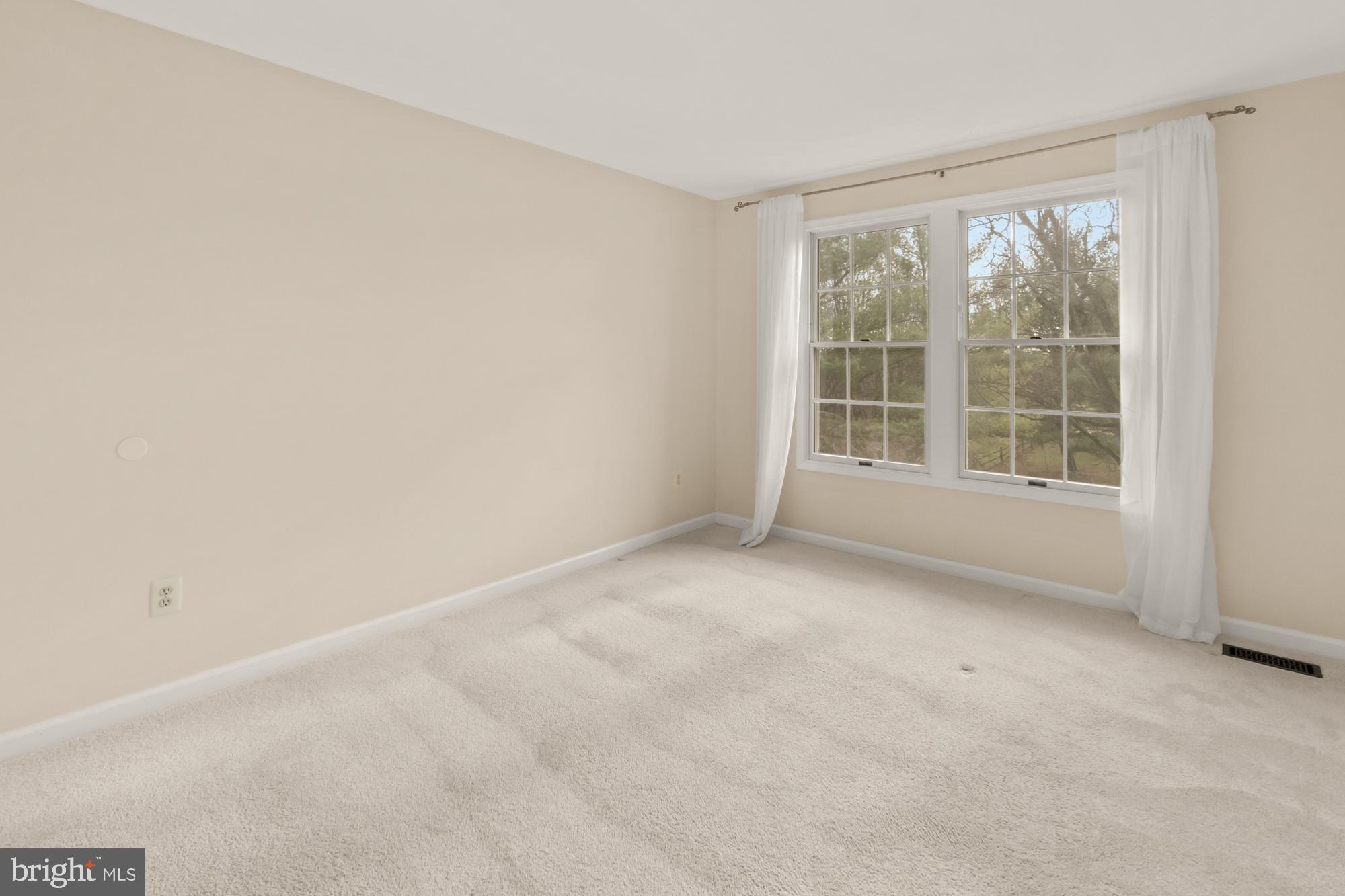 16908 Hoskinson Road Poolesville, MD 20837 - Photo 45 of 72 a view of an empty room with a window