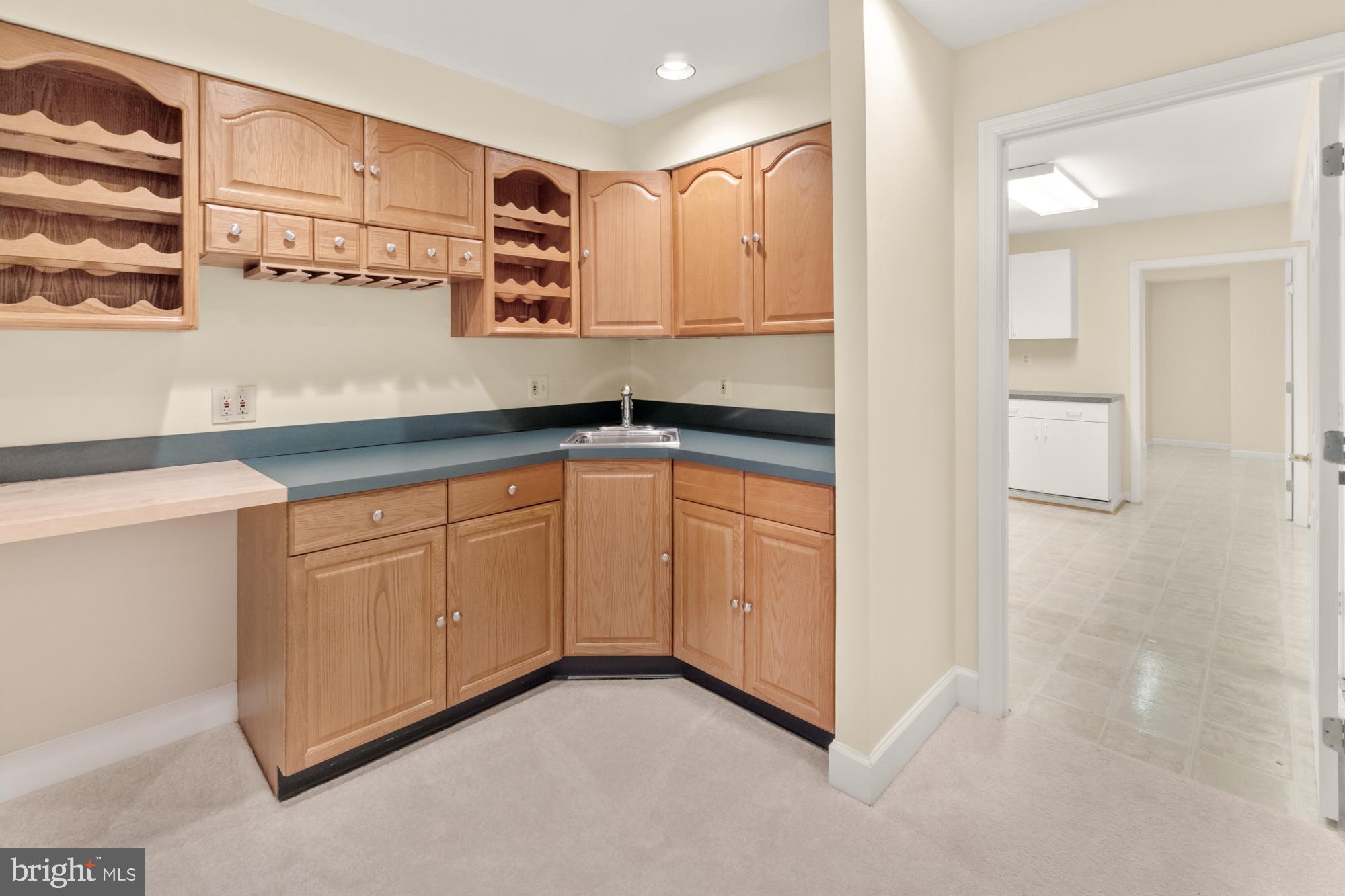 16908 Hoskinson Road Poolesville, MD 20837 - Photo 53 of 72 a view of a kitchen with cabinets
