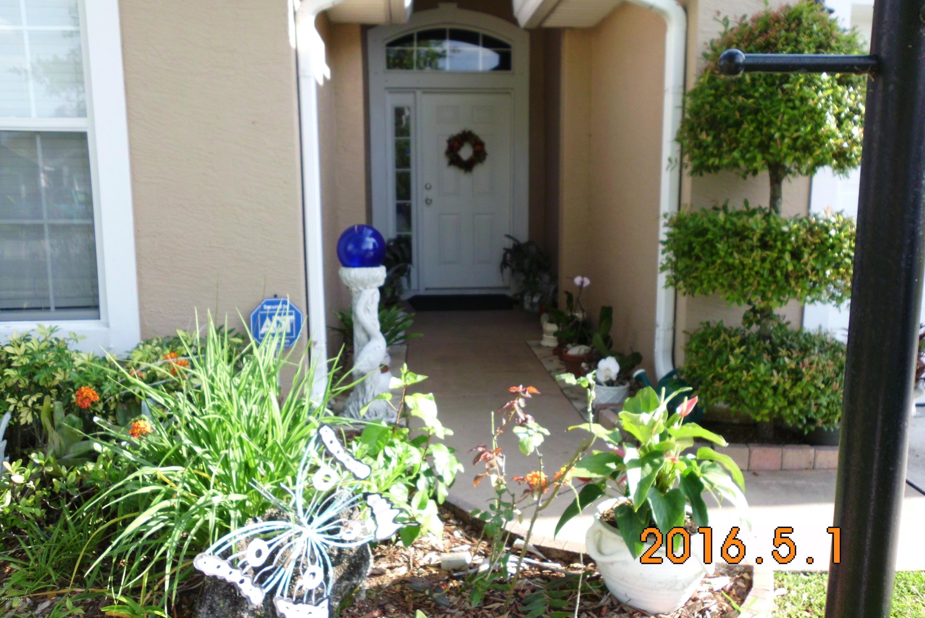 936 Tavernier Circle Northeast Palm Bay, FL 32905 - Photo 3 of 25 FRONT ENTRY