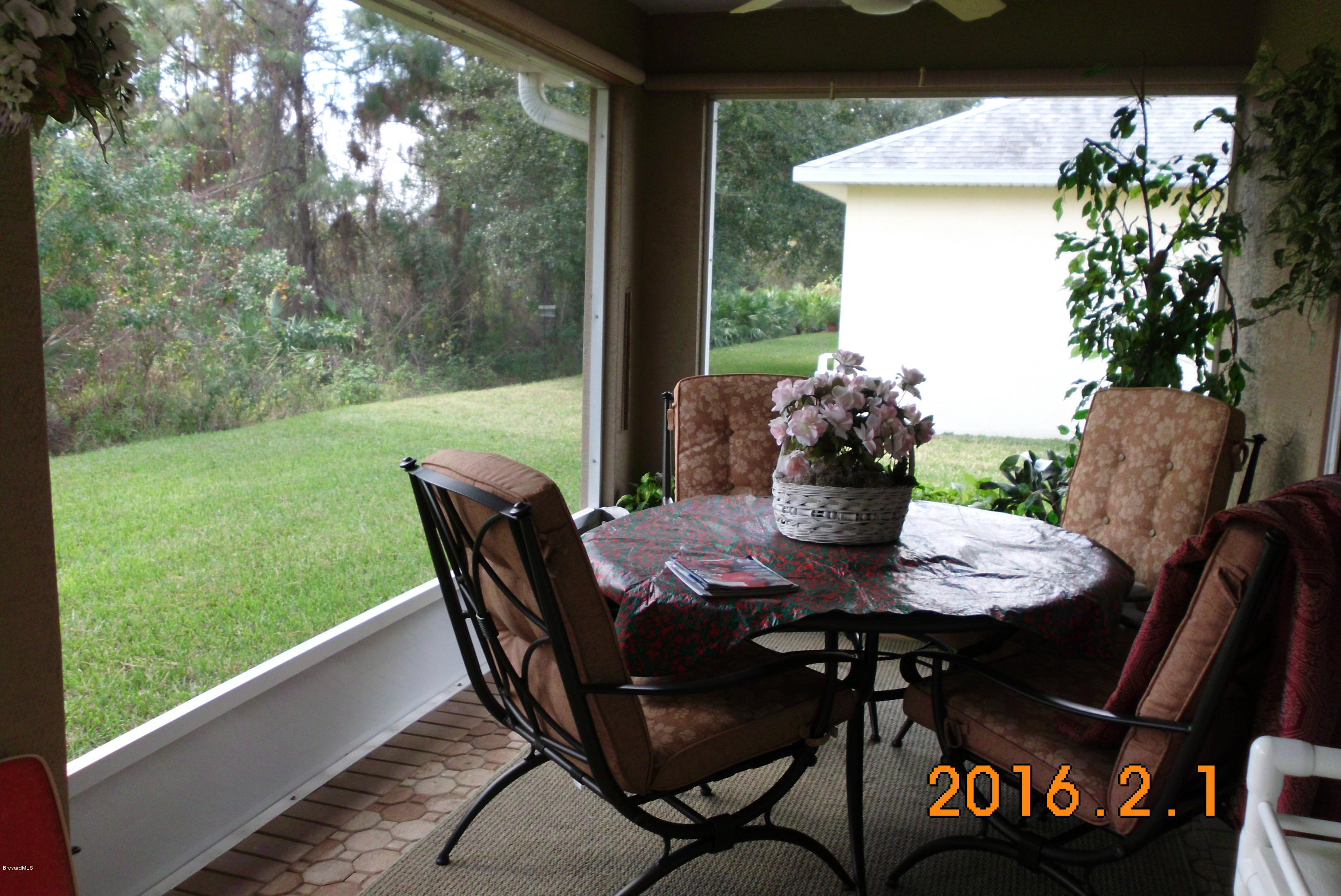 936 Tavernier Circle Northeast Palm Bay, FL 32905 - Photo 22 of 25 Screened Patio