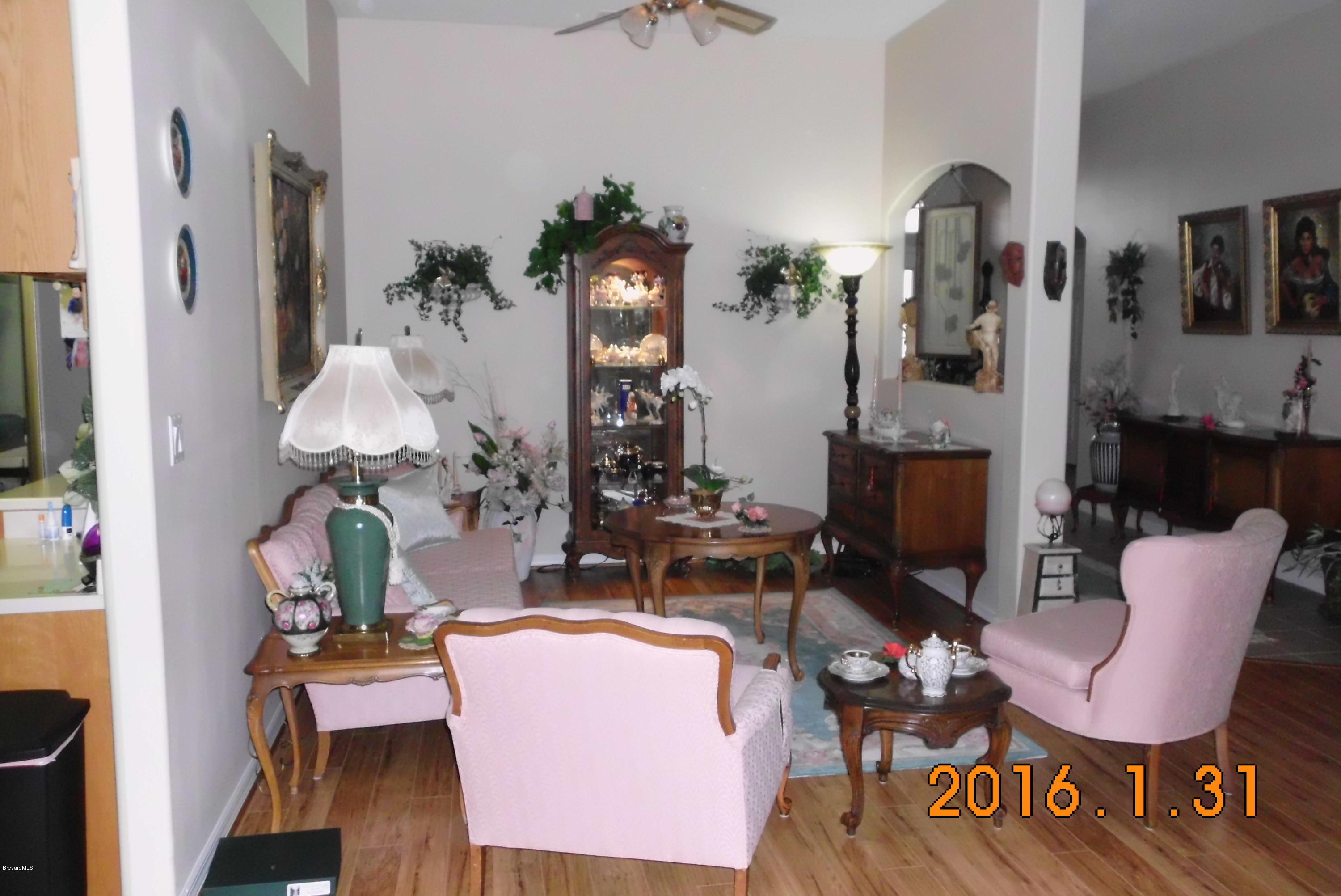 936 Tavernier Circle Northeast Palm Bay, FL 32905 - Photo 4 of 25 Formal Living room