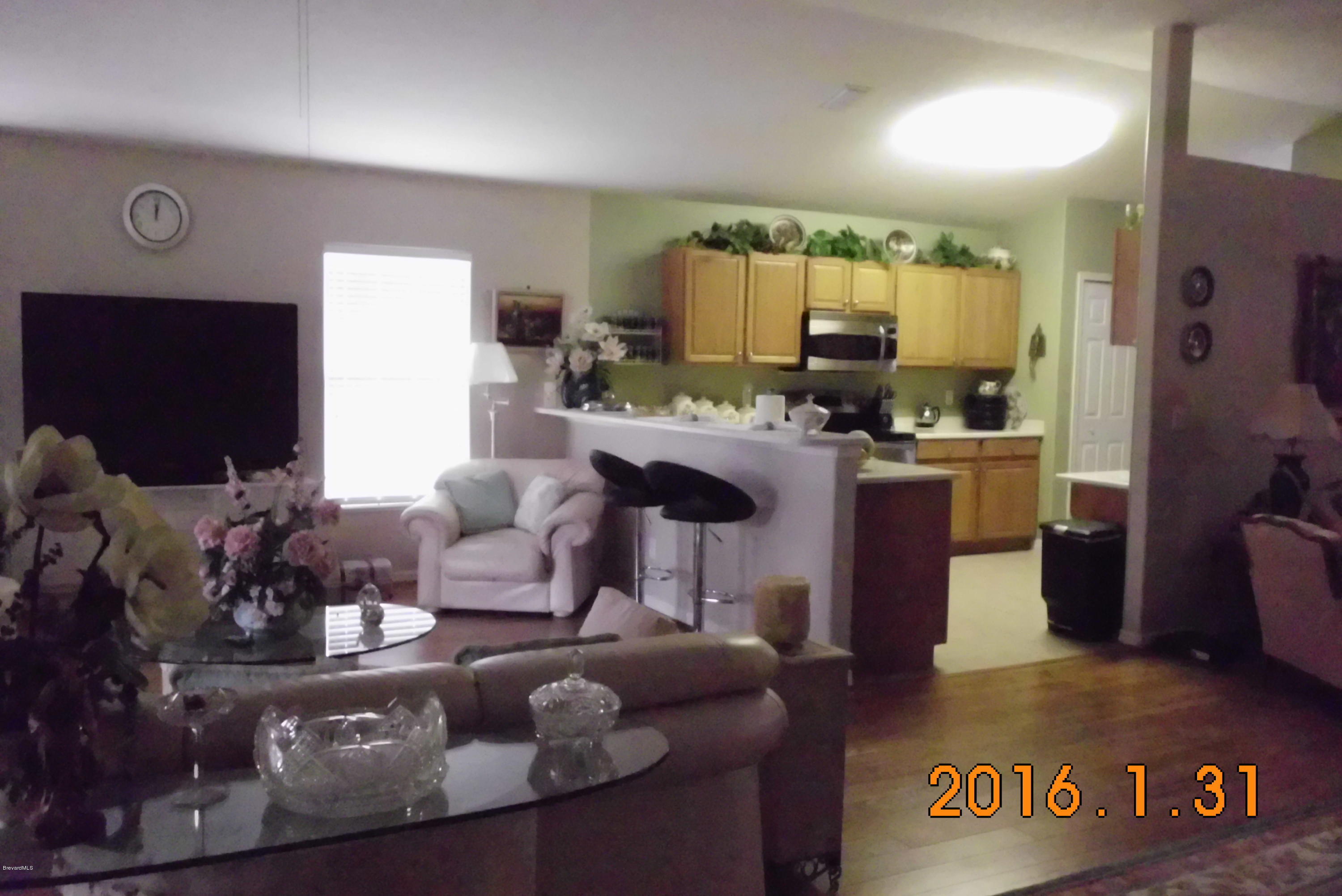 936 Tavernier Circle Northeast Palm Bay, FL 32905 - Photo 5 of 25 Living Area