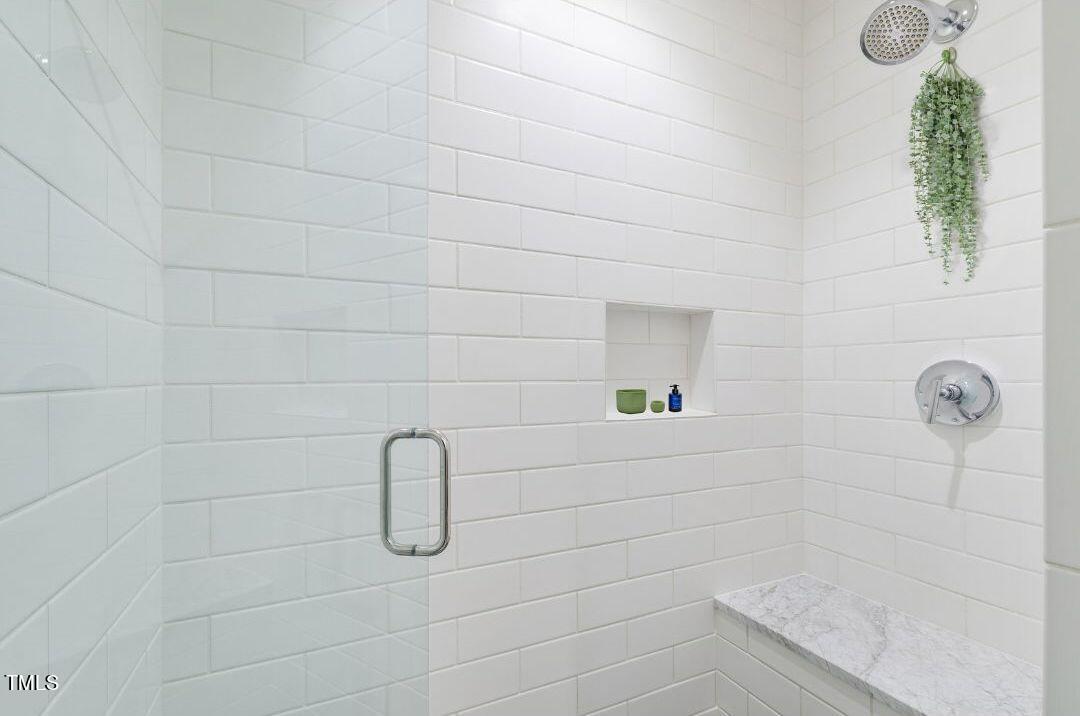 110 Corcoran Street, Unit 2204 Durham, NC 27701 - Photo 16 of 39 a bathroom with a shower