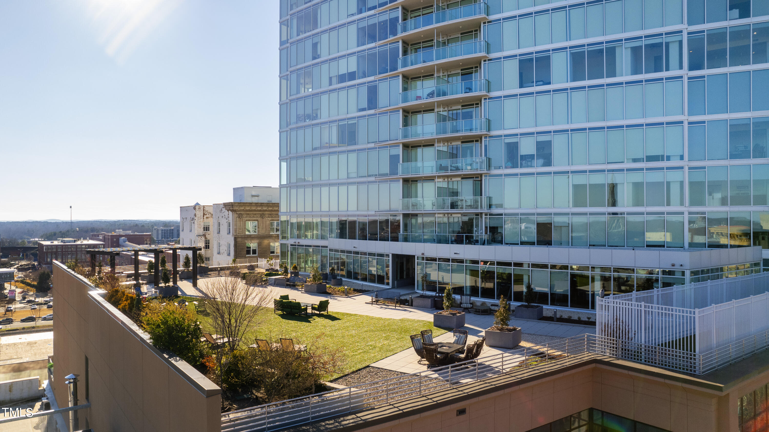 110 Corcoran Street, Unit 2204 Durham, NC 27701 - Photo 31 of 39 a room with lots of furniture and clutter