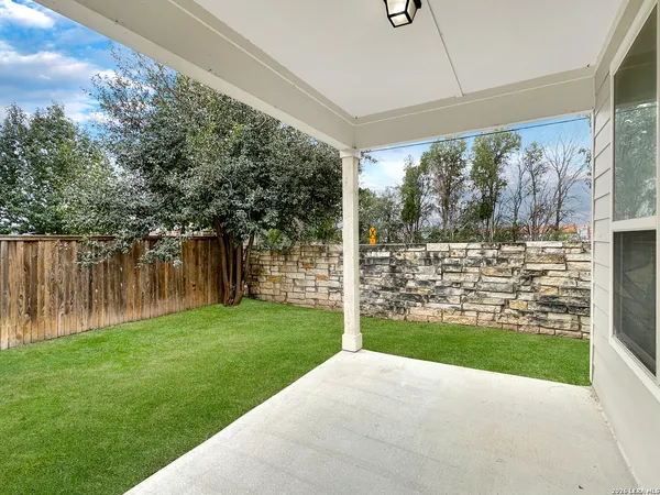 a view of a porch with a yard