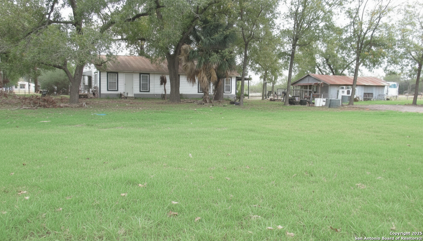 a view of house with a outdoor space