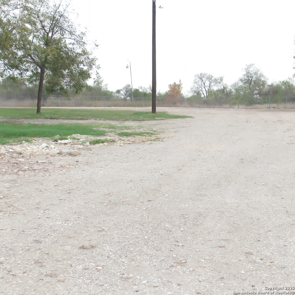 9221 Nelson Road San Antonio, TX 78252 - Photo 12 of 22 a view of a lake with a big yard