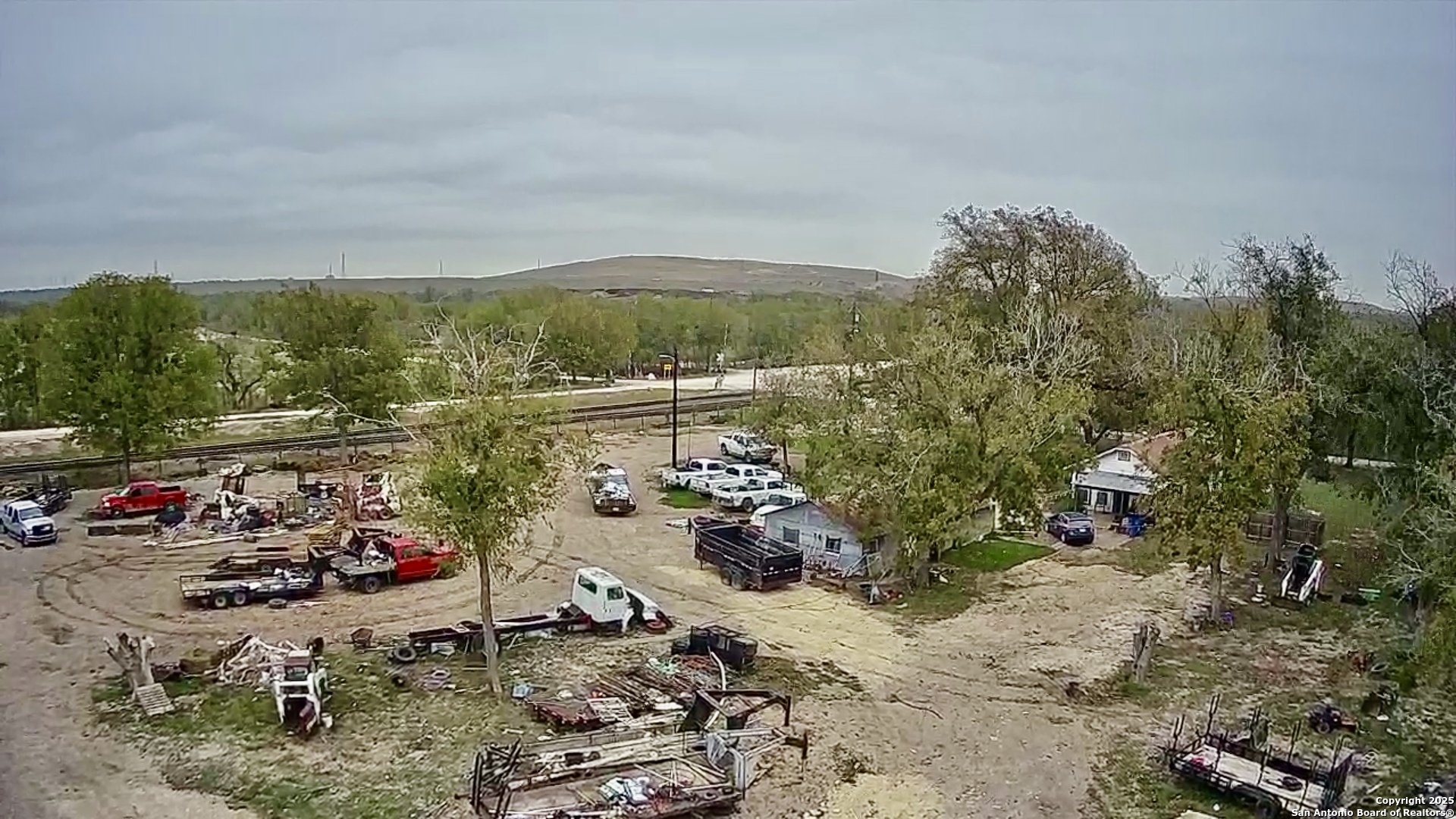 9221 Nelson Road San Antonio, TX 78252 - Photo 13 of 22 a view of a terrace with water view and mountain view